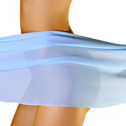 profile of lower female body with see-through blue material in front of buttocks in front of white background